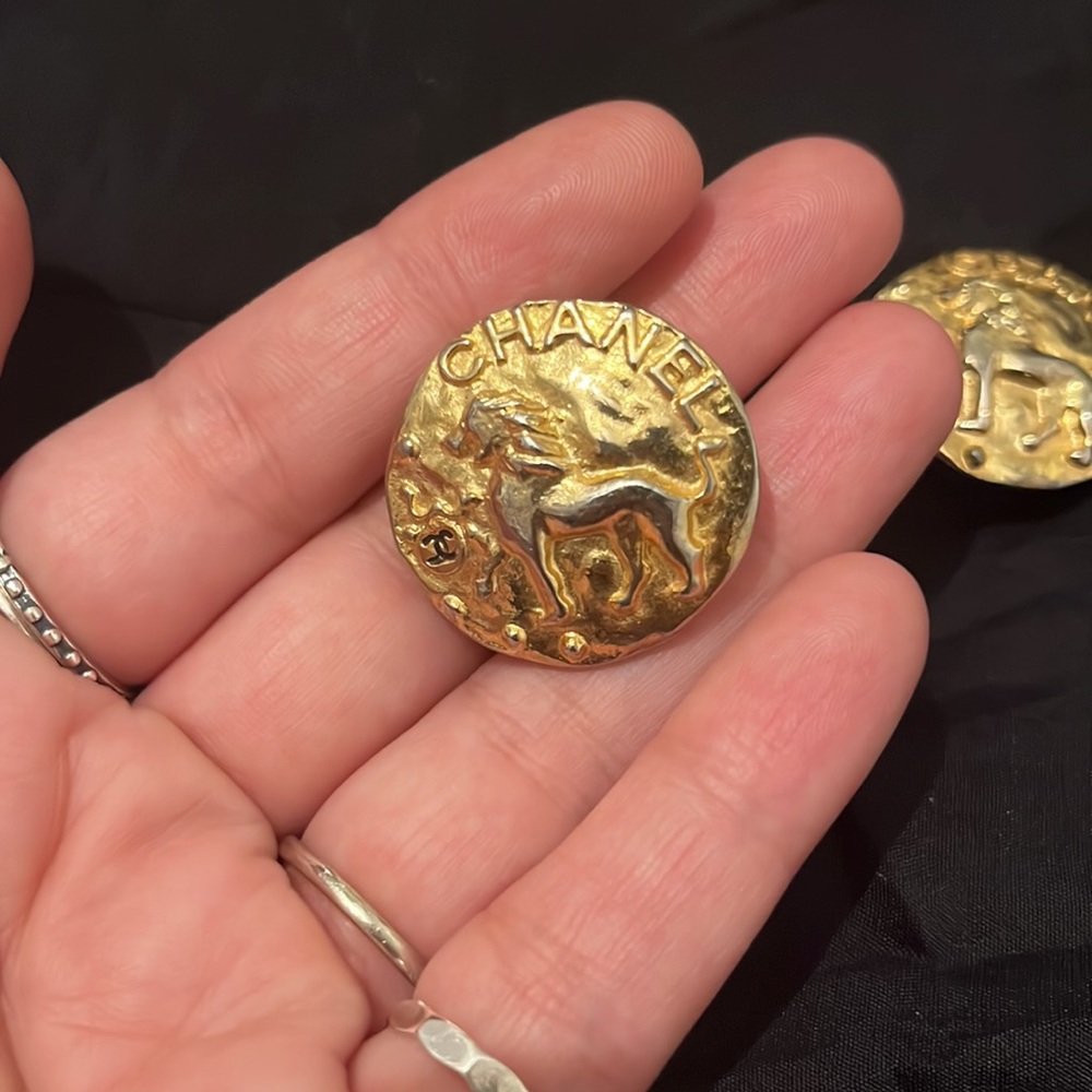 Vintage Chanel clip on round lion earrings